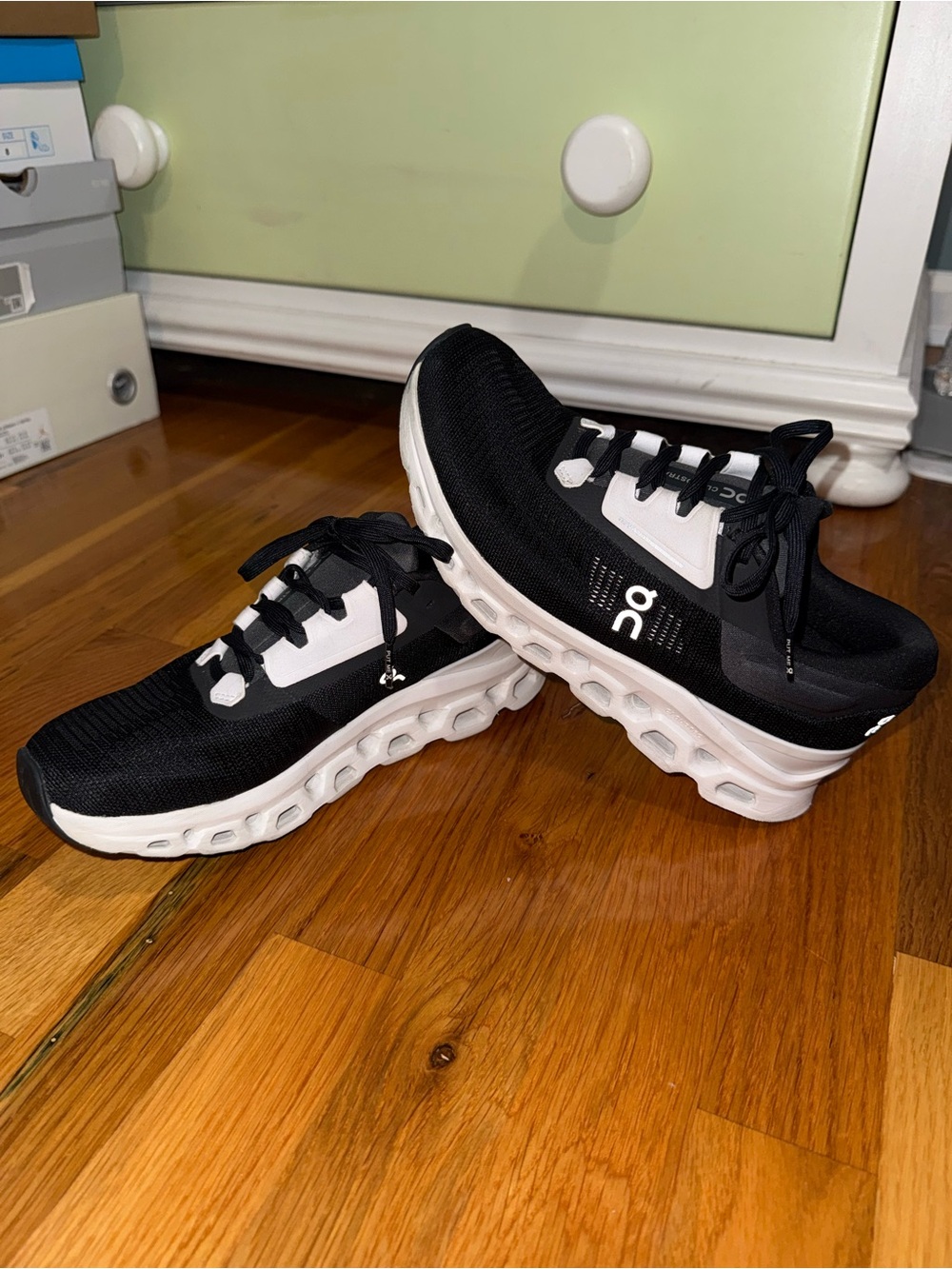 On Cloud Women's Black and White Running Sneakers